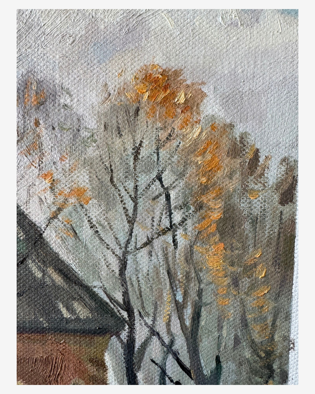 Brushstroke detail of autumnal trees in Van Gogh's Church at Nuenen oil painting