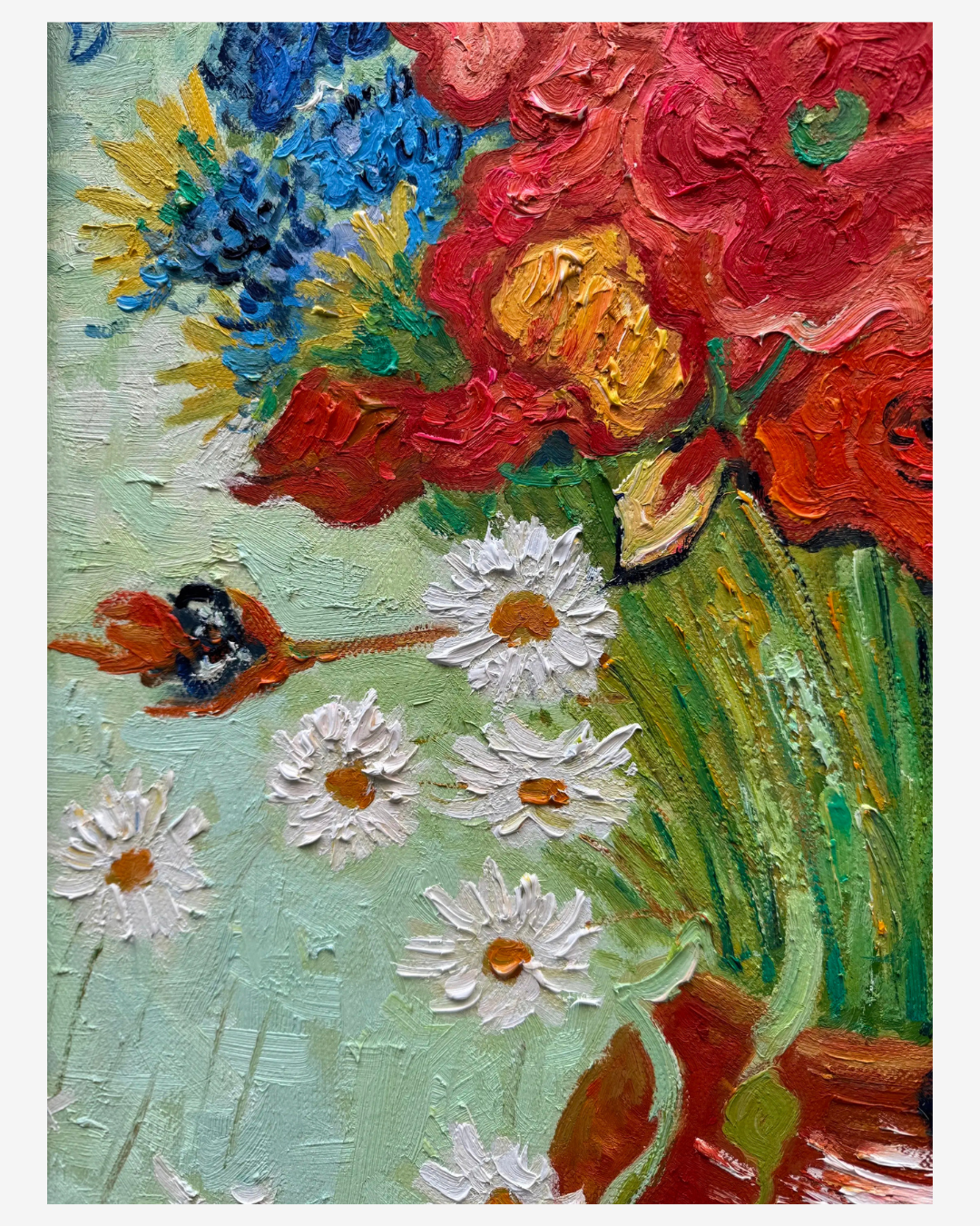 Detailed shot of vibrant red poppy petals on hand-painted Van Gogh floral reproduction